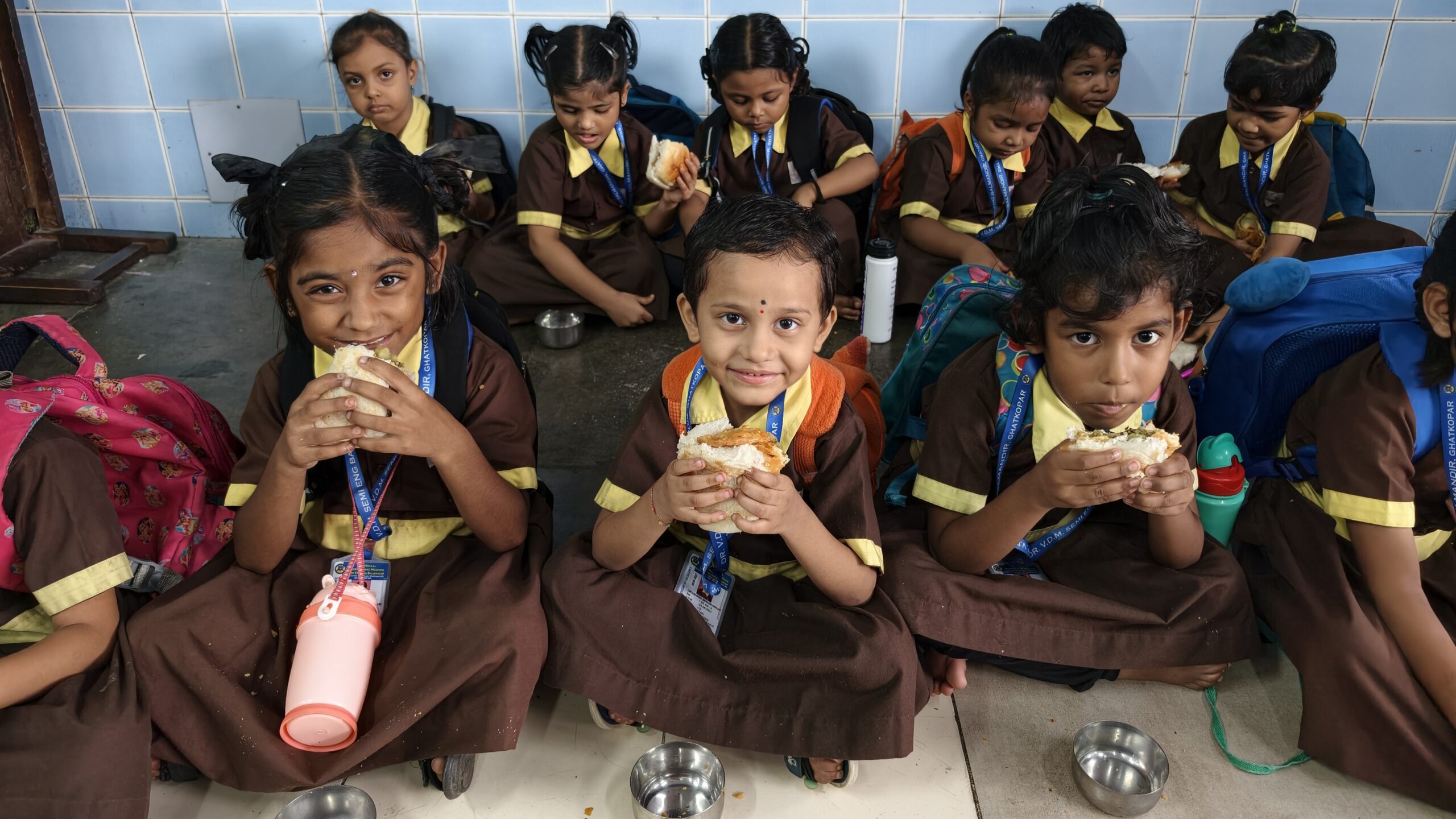 Pre-primary students enjoying nashta