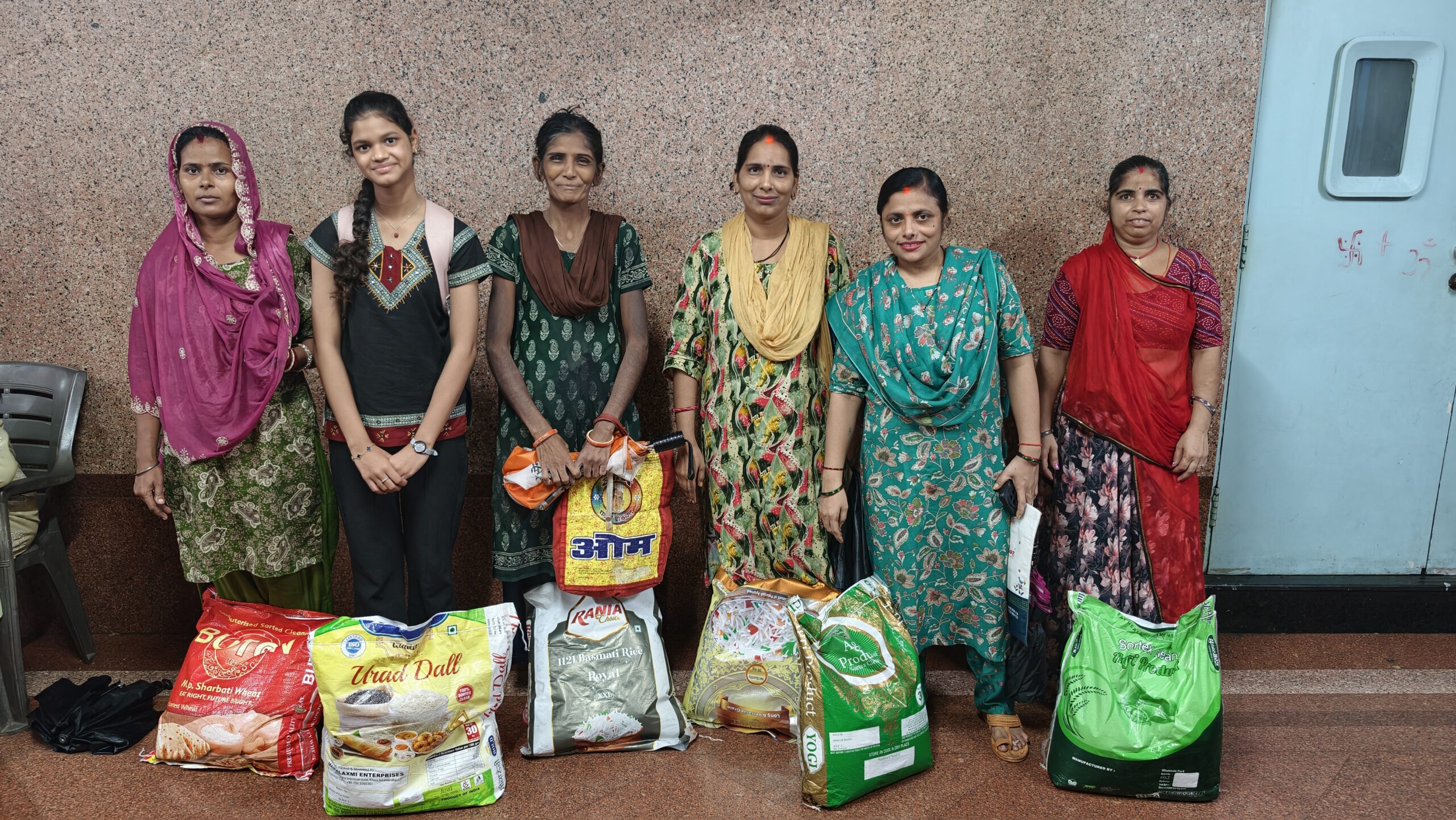 Beneficiaries with ration kits