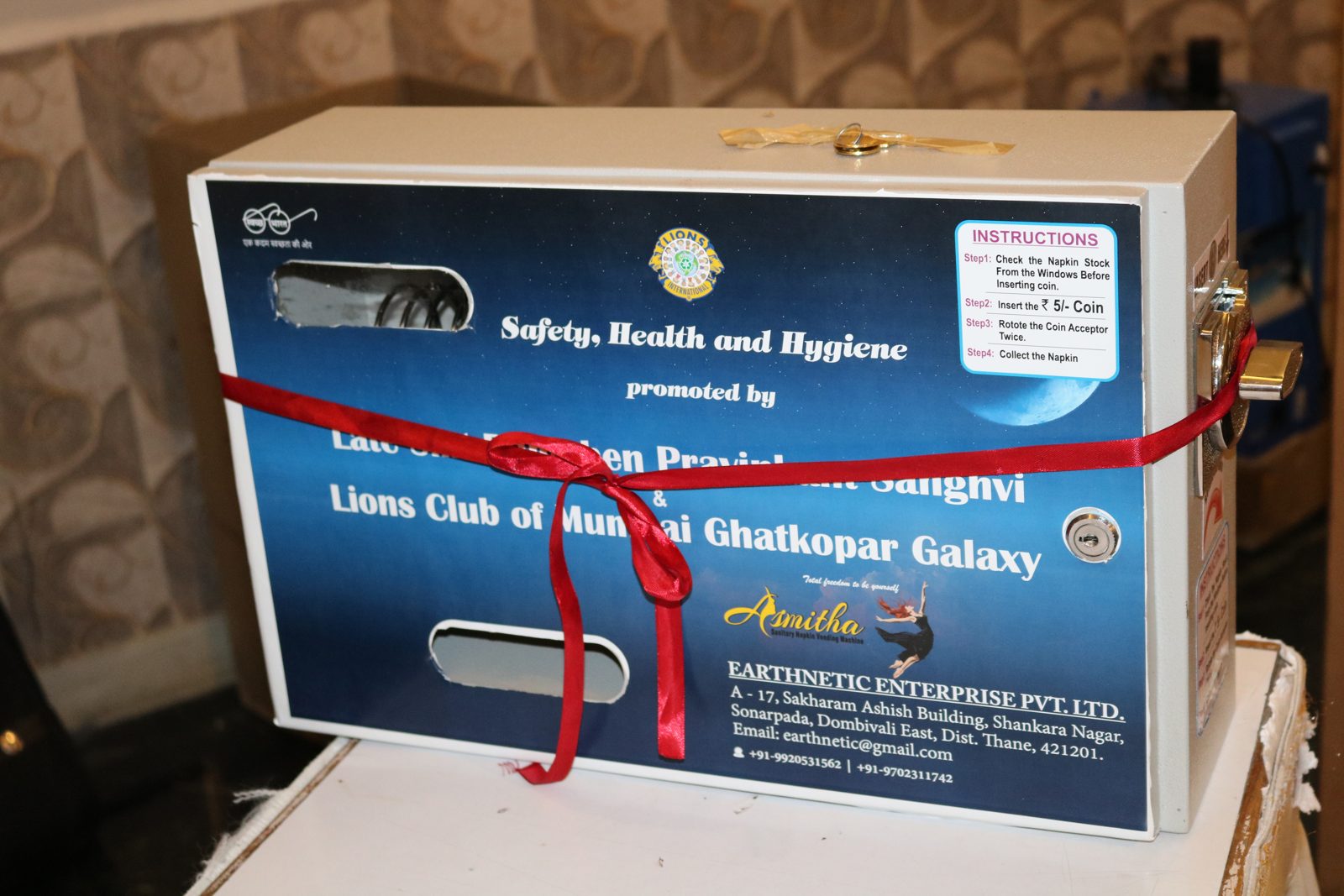 Sanitary napkin dispenser